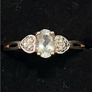 10k gold ring aquamarine light blue stone. Size 6.5